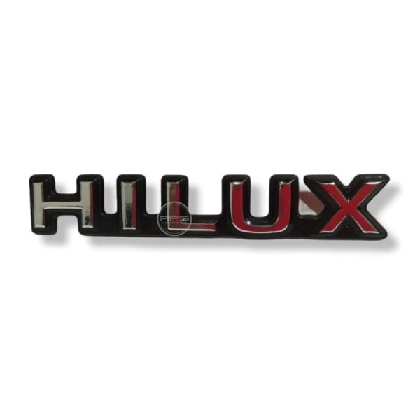 EMBLEMA HILUX "Estampado" Lateral Toyota