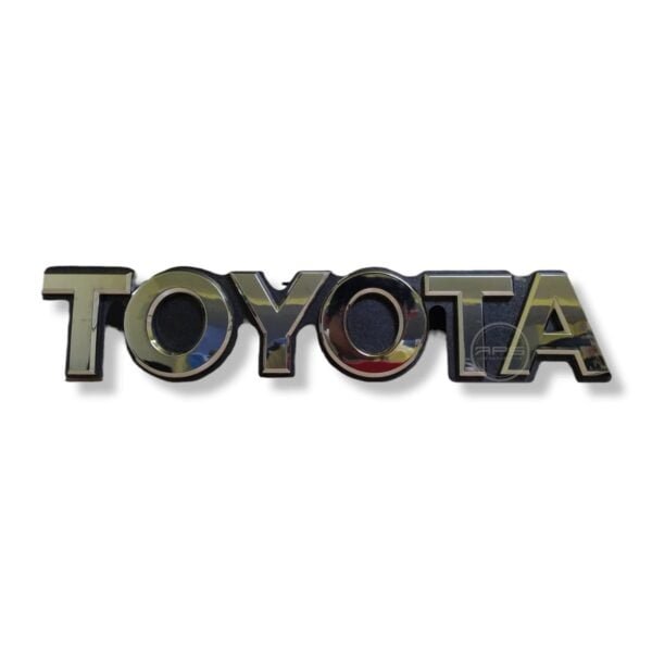 EMBLEMA TOYOTA "Persiana Cromo" CARE MONJA 40x9cm