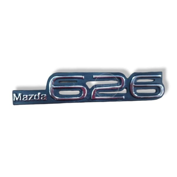 EMBLEMA 626 "Estampado" MAZDA L/LX/GLX MOD 86 BAÚL